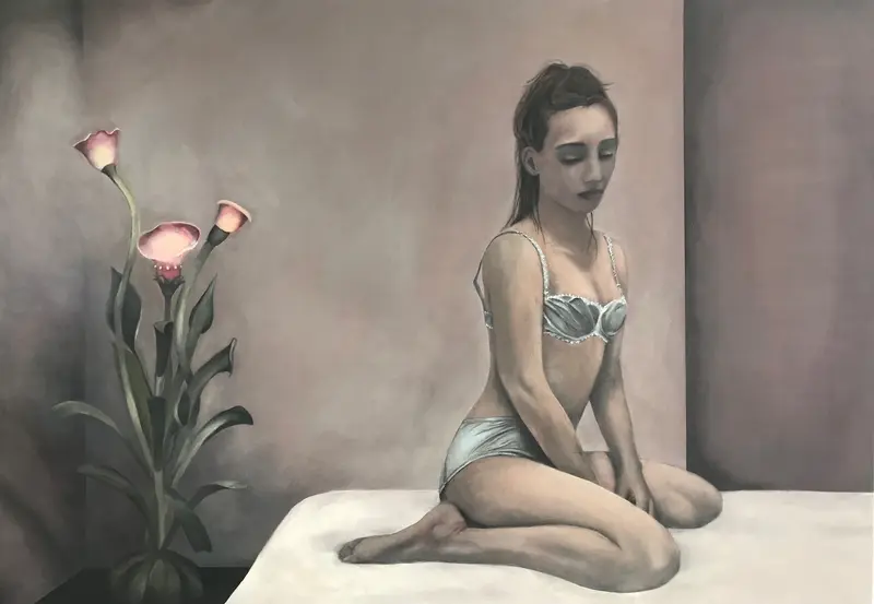 Girl on the edge of the bed